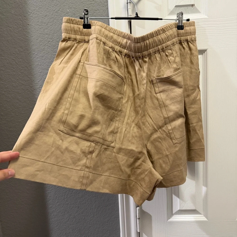 Anthropologie | Maeve La Ponche pull on tan shorts size XL
